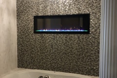 Electric  Fireplace In Batroom